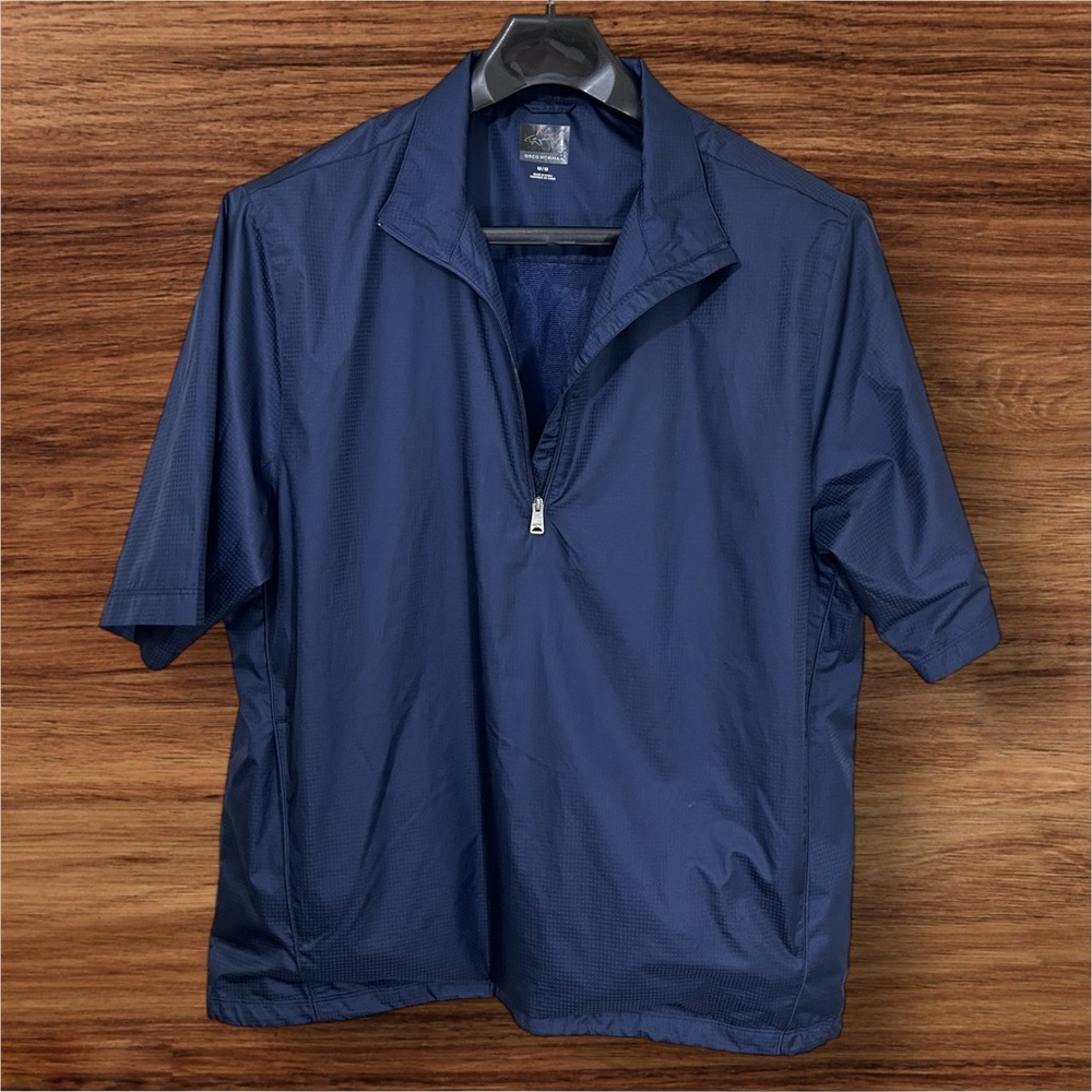 Greg Norman Men’s Blue Short Sleeve Golf Windbreaker Shirt. Size Medium.